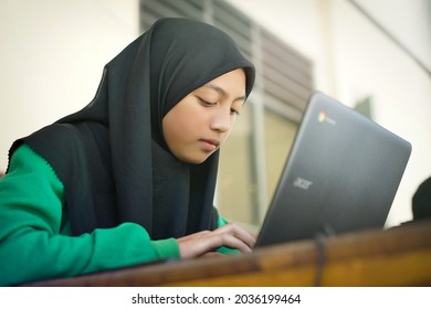 Bawang, Jawa Tengah, Indonesia - August 16 2021

Indonesian Junior High School Students Study Online Using Chromebook Laptops