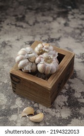 Bawang Putih Or Garlic As Seasoning Served In A Box,blurred Background