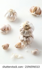 Bawang Putih Or Some Fresh Garlic Served On The Table,blurred Background,on White Background