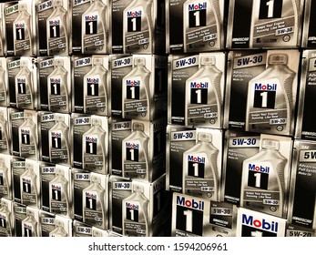 BAXTER, MN - 8 DEC 2019: Store Display Of 5W-30 Motor Oil. Mobil 1 Is A Brand Of Synthetic Motor Oil And Other Automotive Lubrication Products.