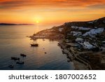The bay of Agios Ioannis on the island of Mykonos during summer sunset time, Cyclades, Greece