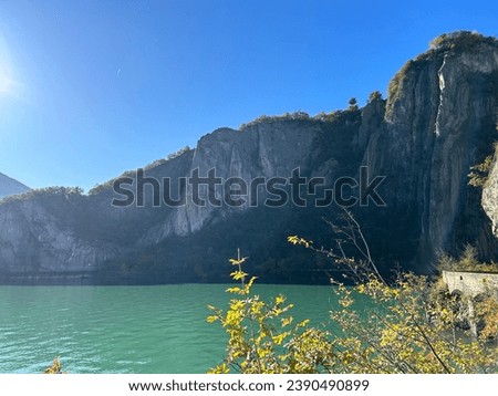 Bay of the bogn, an enclosed bay with vertical slabs of limestone plunging Mount Clemo, Lake Iseo, Brescia province, Lombardy region, Italy, Europe