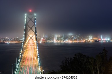 Bay Bridge And Downtown San Francisco Covered By Fog