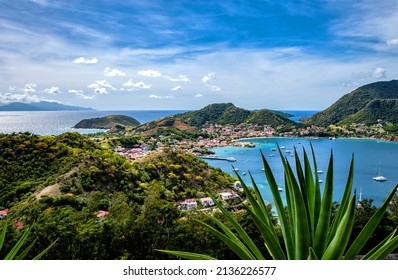 Bay of Les Saintes, Terre-de-Haut, Iles des Saintes, Les Saintes, Guadeloupe, Lesser Antilles, Caribbean.
Village Le Bourg in the middle, Le Chameau Mountain on the right.