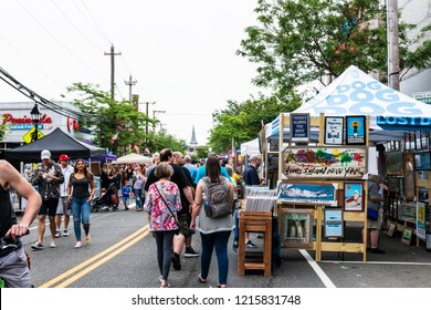 Bay Shore, New York, USA - 10 June 2018: Vendors Selling Artwork And Goods, With People Strolling On Main Street During A Street Fair In Bay Shore Long Island.