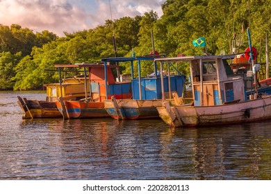 Bay At Sunset With Fishing Trawler Rustic Boats In Porto Seguro, BAHIA, Brazil