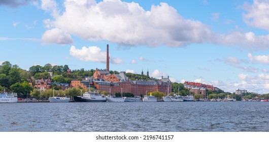 Bay View At Riddarfjärden, Old Brick Brewery, Ships Marooned At The Pier A Sunny Day With Cumulus Clouds In Stockholm, Sweden 2022-08-31