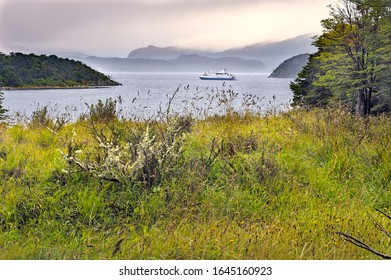 Bay Wulaia, Navarino Island, Cape Horn, Antartica Chilena Province, Magallanes Y La Antártica Chilena Region, South America - March, 11, 2010: View Of The Bay With Tourist Boat