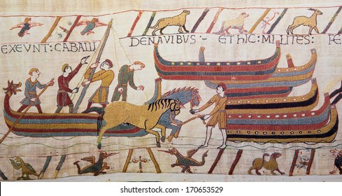 BAYEUX, FRANCE - FEB 12: Detail Of The Bayeux Tapestry Depicting The Norman Invasion Of England In The 11th Century On February 12, 2013. 