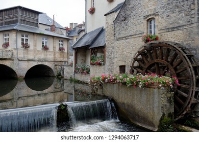 Bayeux, Normandy/France - 07/13/2012: Walking Along The Canal Towards The Bayeux Tapestry Museum.