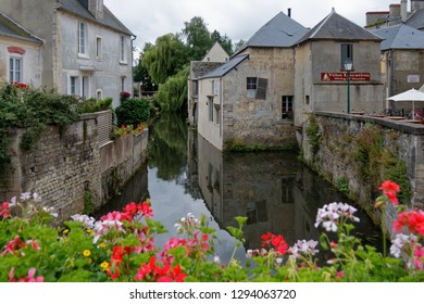 Bayeux, Normandy/France - 07/13/2012: Walking Along The Canal Towards The Bayeux Tapestry Museum.