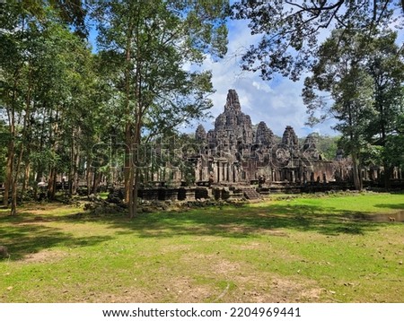 The Bayon is a richly decorated Khmer temple related to Buddhism at Angkor in Cambodia. The Bayon stands at the centre of Jayavarman's capital, Angkor Thom.