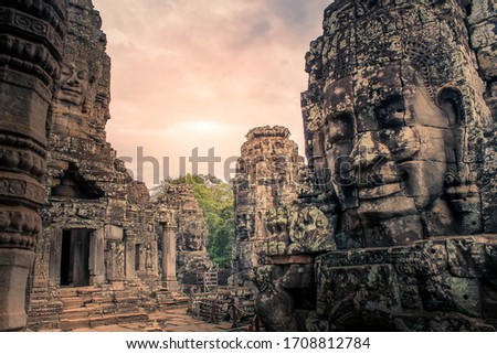 Bayon temple in Siem Reap ancient faces with cloudy day