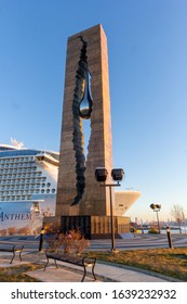 Bayonne, NJ / United States - Feb. 8, 2020: Vertical Image Of The Tear Drop Memorial At Sunrise.