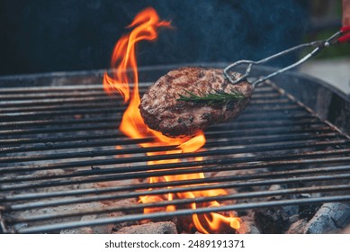 BBQ Barbecue grilled meat stick on fire flame with hot charcoal cooking outside. Beef grilling picnic outdoor with smoke bacon spicy sausage for party. Grill pork bbq on fire flame