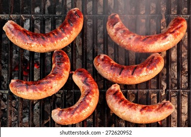 BBQ Bratwurst Spicy Browned Sausages On The Hot Grill, Top View