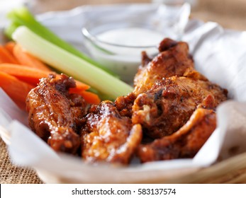 Bbq Buffalo Chicken Wings In Basket, With Ranch Dip, Carrot And Celery Sticks