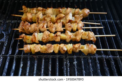 BBQ Chicken And Pork Steaks On A Hot Summer Sunday Afternoon In Southern Illinois, USA