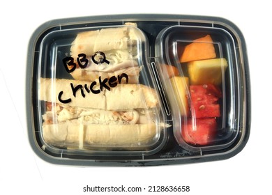 BBQ Chicken Sandwich with Fresh Fruit. Restaurant Food to Go. Food Delivery. Lunch. Dinner. Packaged Food to go. Chicken Sandwich. Isolated on white. Room for text. Fresh Made Sandwich. Barbecue. - Powered by Shutterstock