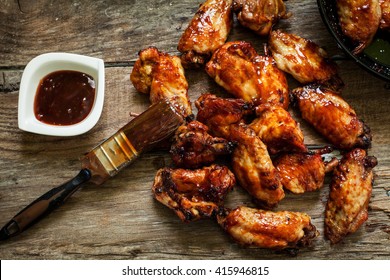BBQ chicken wings with sauce for dip