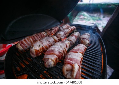 BBQ Chicken Wraped In Bacon. Bacon Grilled On Gas Weber Grill.