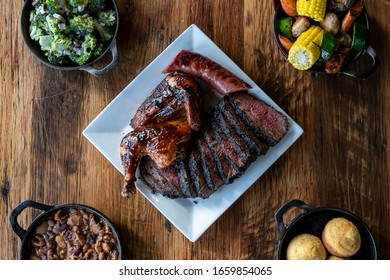 Bbq Food And Sides On Wood Table
Overhead Photo, Spread