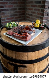 Bbq Food And Sides On Wood Table
Overhead Photo, Spread