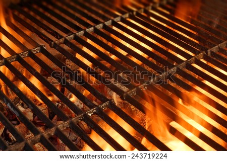 BBQ Grill with Glowing Coals and Bright Flames