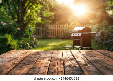 BBQ grill in the yard background with empty wooden table - Powered by Shutterstock