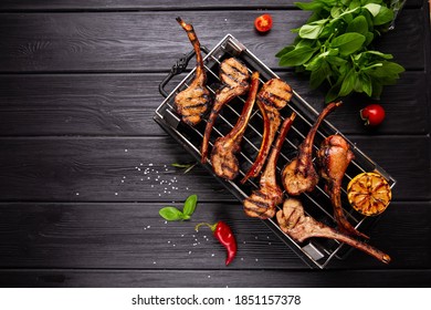 .bbq Lamb Racks Grilled With Basil Background