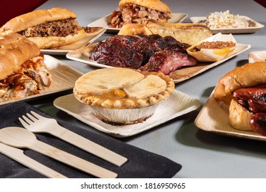 BBQ Meal Buffet Served Family Style Spread On A Table Showing A Variety Of Choices Of Meals To Eat.