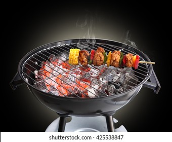 BBQ On Grill, Isolated On Black Background