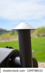 BBQ Pellet Smoker Chimney Stack In Backyard