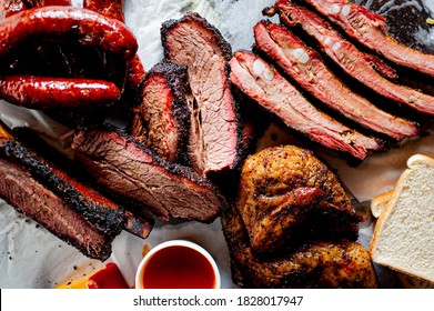 BBQ platter. Barbecue pork ribs, brisket, beef ribs and chicken served with classic bbq sides Mac n cheese, cornbread, Brussels sprouts, coleslaw & beer. Classic traditional Texas meats & side dishes.