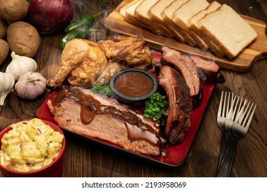 Bbq Platter - Brisket, 4 Baby Back Ribs, Smoked Chicken Half, ½ Loaf Bread, Potato Salad