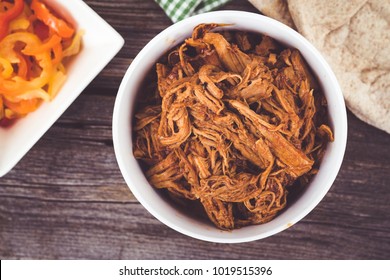 Bbq Pulled Pork Bowl Over A Wooden Plank Table