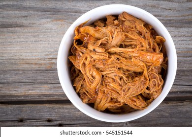 Bbq Pulled Pork Bowl Over A Wooden Plank Table