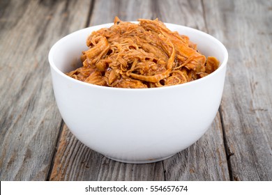 Bbq Pulled Pork Bowl Over A Wooden Plank Table