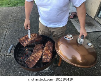 BBQ Ribs In The Backyard On The Pit