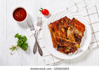 BBq Ribs On White Plate On White Wooden Table, Horizontal View From Above, Flat Lay