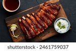 BBQ ribs - Tender ribs slathered in tangy barbecue sauce.
