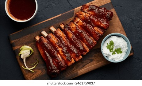 BBQ ribs - Tender ribs slathered in tangy barbecue sauce.
