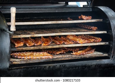 Bbq Spareribs In Barbecue Smoker, Grilled Pork Meat Ribs