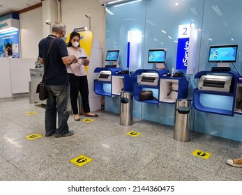 BCA Bank Customers Queue To Make Financial Transactions At Tellers Like BCA In Surabaya, Indonesia On April 10, 2022