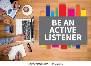 BE AN ACTIVE LISTENER Business Team Hands At Work With Financial Reports And A Laptop