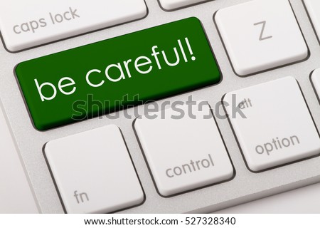 Be careful word written on computer keyboard.