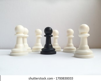 Be Different Concept, One In Crowd , One Black Pawn With Lot Of White Pawns, Black Sheep . Against All Odds Concept 