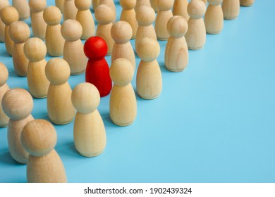 Be different in the crowd. Unique red figure with wooden ones.