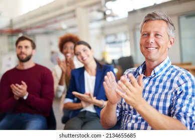 Be Eager To Know. A Group Of Colleagues Applauding A Work Presentation.