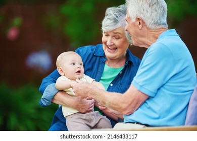 Be The Grandparent You Want Them To Remember. Cropped Shot Of A Senior Couple Spending Time With Their Grandson.